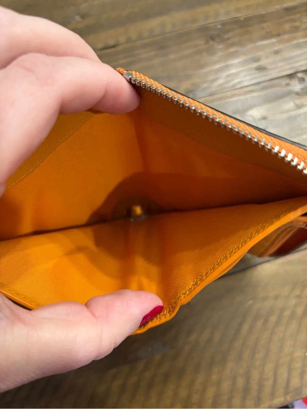 Coach Pebbled Leather Zip Wallet in Metallic Orange
